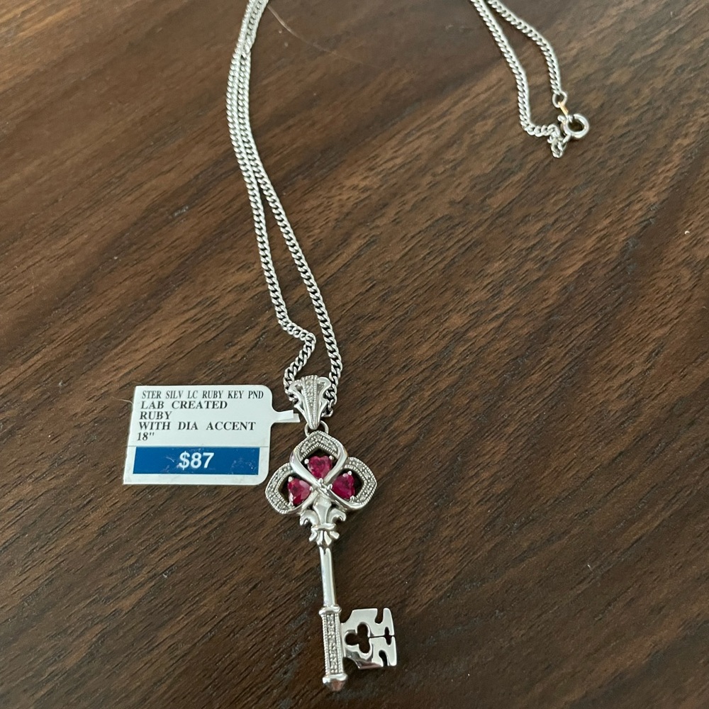 Sterling silver necklace with key ruby pendant